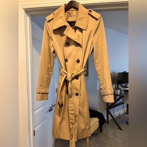 Calvin Klein trenchcoat with epithets and belt